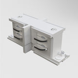 Close-up of the 3-Phase Surface-Mounted Track Trinity Internal Straight Connector - White, showing its unique interlocking sections and circular studs. It appears clean and simple against a plain white background.