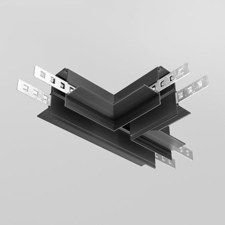 Close-up of the angular Exility Tracks T-Connector Built-in for Plasterboard 12.5mm - Black with intersecting beams and light brackets on a gray background, showcasing its intricate design.