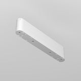 The Radity Magnetic Track Long Adaptor - White is a minimalistic, rectangular ceiling light fixture made from plastic, with rounded edges and multiple mounting holes. Its clean design viewed against a grey background makes it ideal for modern interiors.