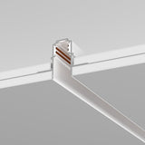 The Exility Magnetic Recessed Track 1m for Plasterboard 12.5mm in white is shown against a gray background, showcasing its internal structure and wiring with intersecting tracks and visible copper conductors.