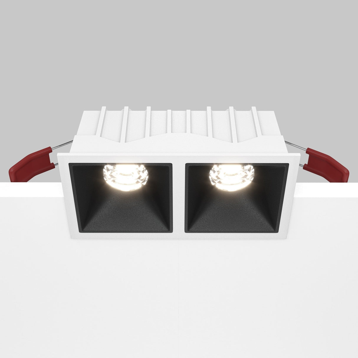 Mobility and control feature of the Alfa LED Dimmable Fixed Square Recessed Twin Downlight in white and black, allowing light adjustment.