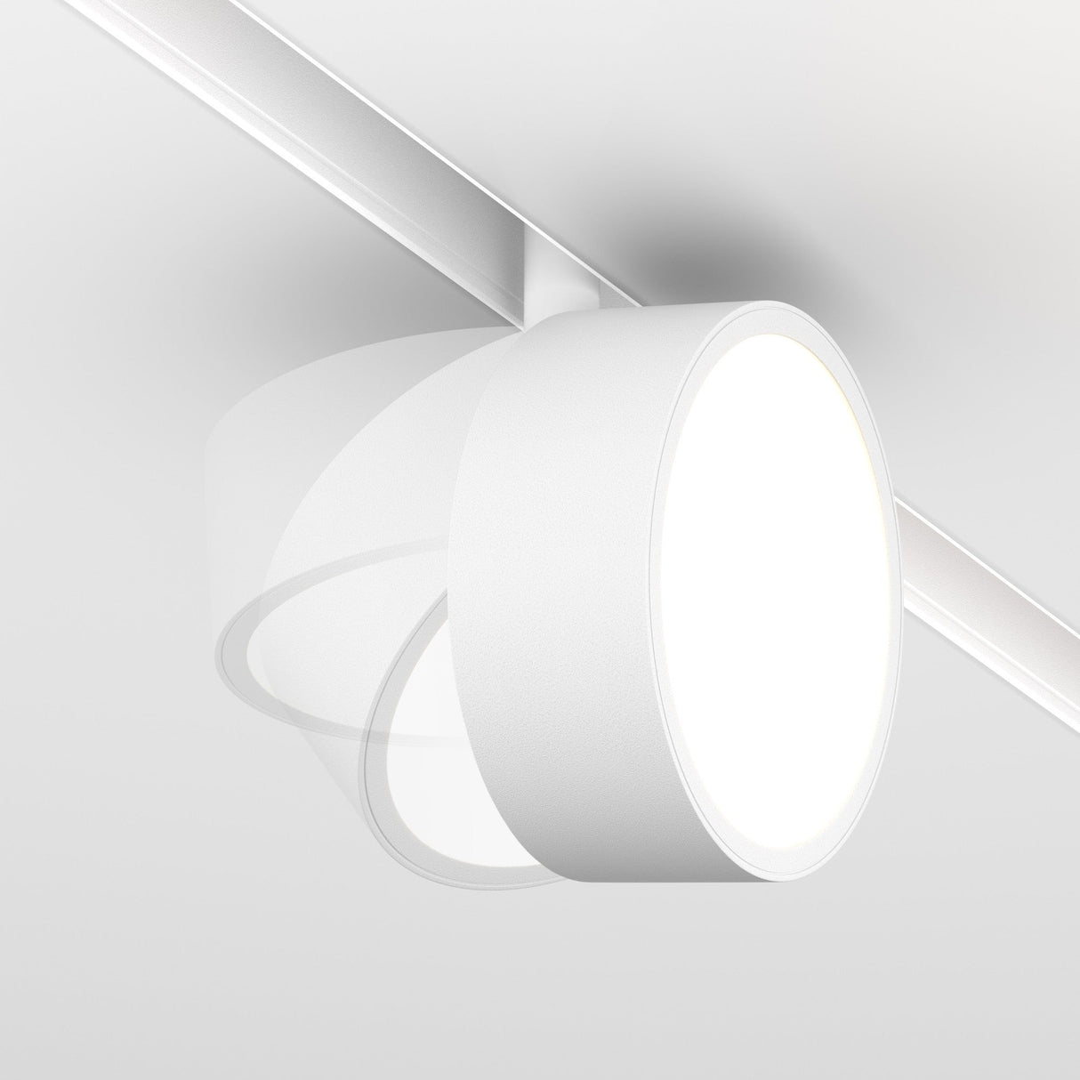 The Rado DALI CCT LED Dimmable Magnetic Exility Track Spotlight in white is a sleek, minimalist 18W ceiling fixture. It features a circular light with adjustable swivel capabilities on a silver track and offers 2700-6000K color temperature range.