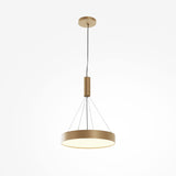 The Zon LED Medium Flush Ceiling Light in matte gold features a circular design with black cords, emits ambient lighting at 3000K, and incorporates an integrated 45W LED for a soft, warm glow ideal for contemporary interiors.