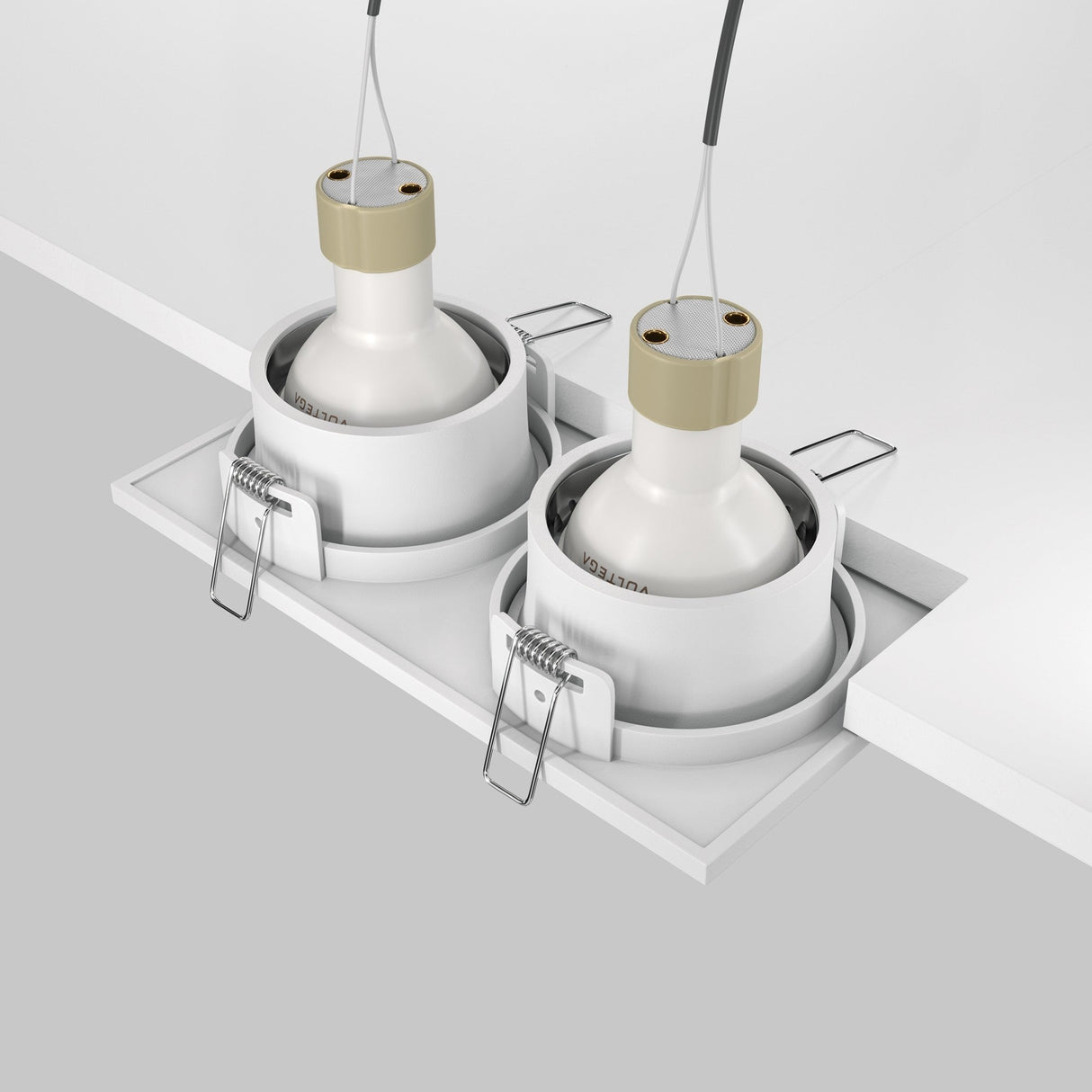 The Zoom Twin Fixed Rectangular Recessed Downlight - White is installed on the ceiling with white cylindrical housings, beige sockets, and metal clips. Wires extend from each socket, enhancing its contemporary look when viewed from a side angle.