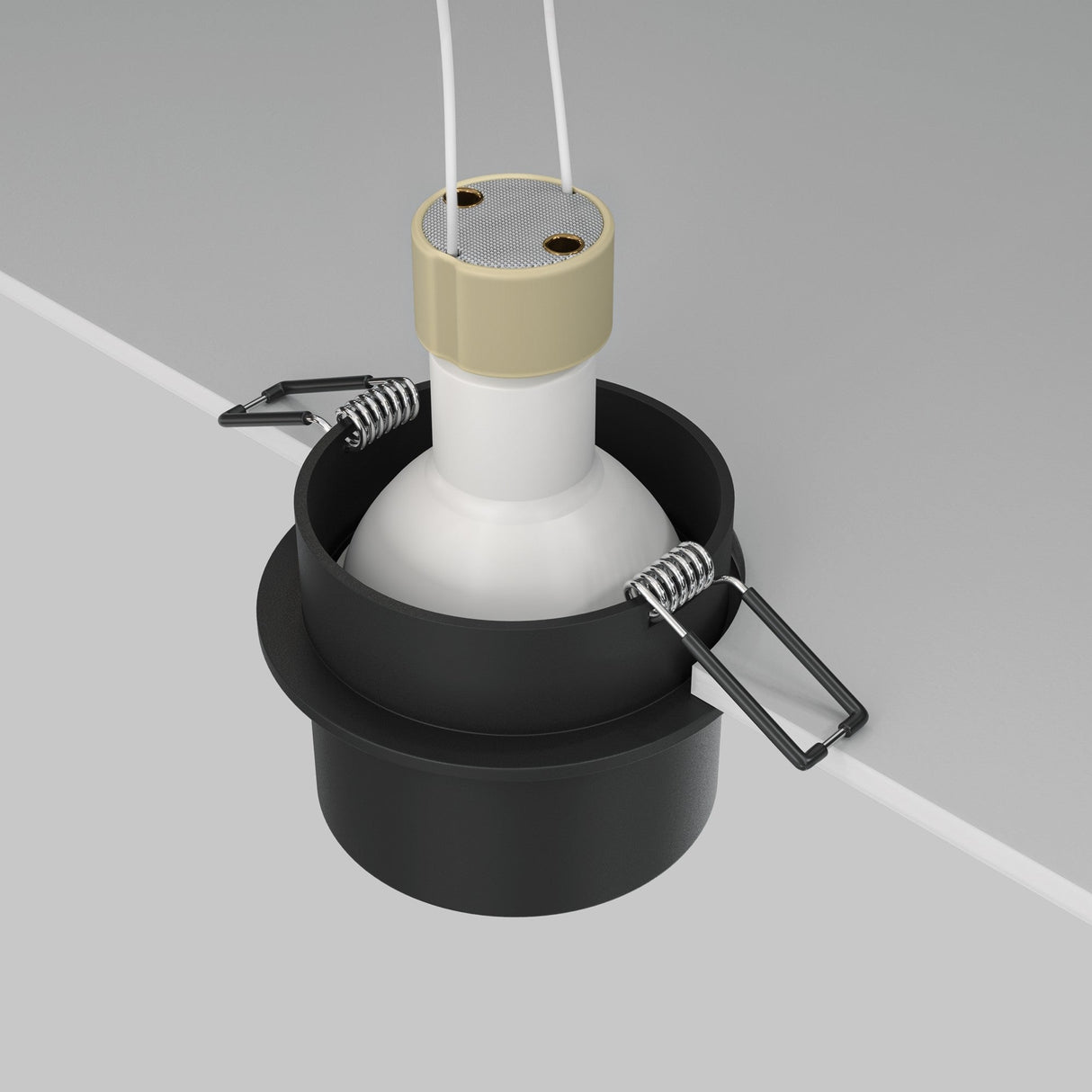The Reif Round Recessed Downlight With Extended Rim - Black features a white cylindrical body with an extended rim, a black circular casing, and metal clips. Two white wires extend from the top, providing minimalist overhead lighting when ceiling-mounted above a flat surface.
