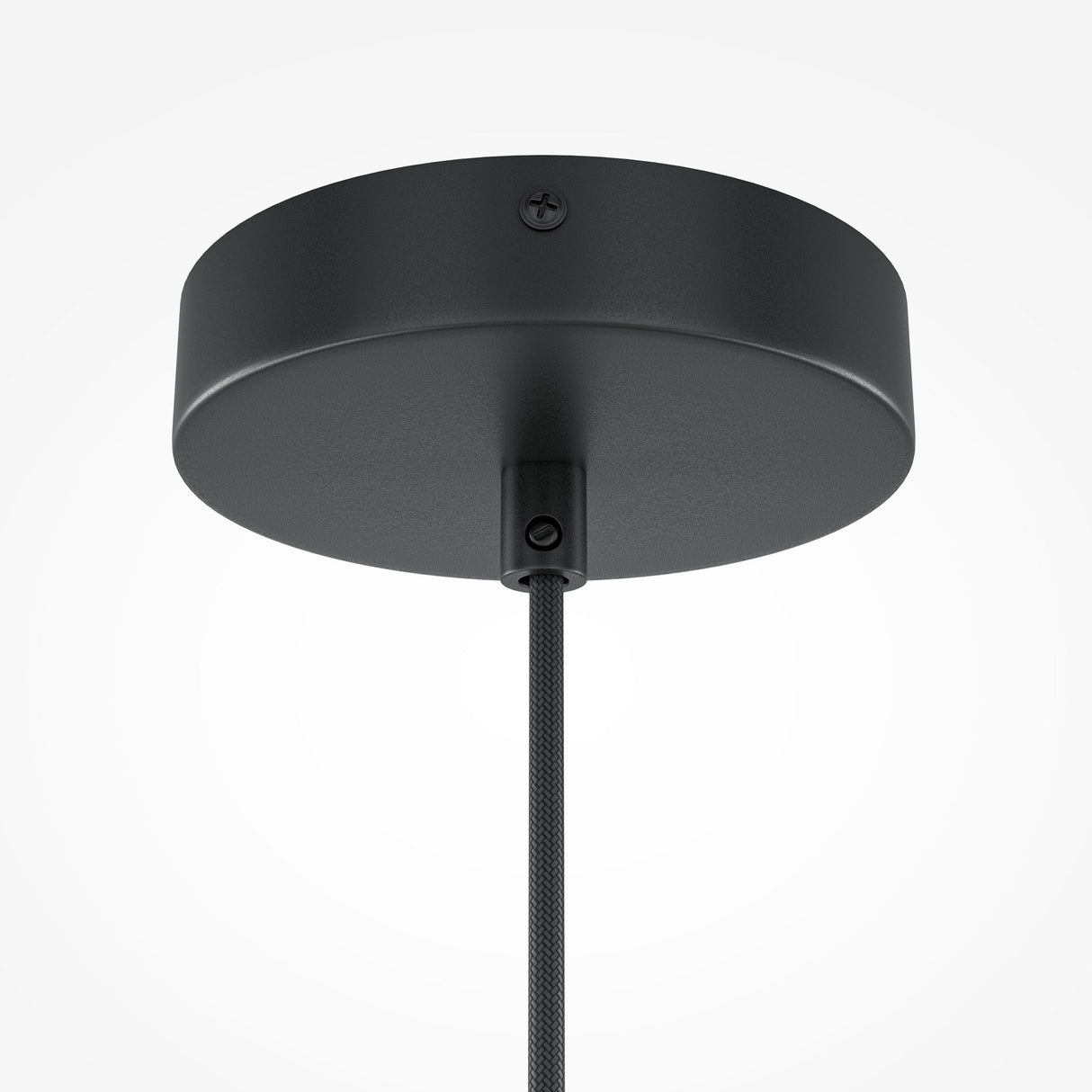 A close-up of the Roots Pendant Light features a black ceiling fixture with a round base and a single braided cord, showcasing modern design. The elegant beige wooden half-dome shade contrasts beautifully against the white background.