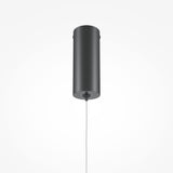The Halo Dimmable LED Long Slim Pendant Light in black, 15W, with an adjustable 3000-4000K range, features a minimalist cylindrical design that hangs elegantly from a cord against a white background, highlighting modern aesthetics and cutting-edge lighting design.