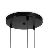 The Basic Form 3 Light Cluster Pendant features a sleek black circular mount and three cords, offering a minimalist and modern design with industrial flair.