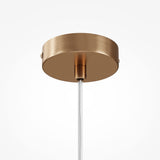 A close-up of the Basic Form Globe Pendant Light 20cm showcases a gold base with frosted and clear glass. Its adjustable transparent cable extends centrally, exuding modern elegance against a plain white background.