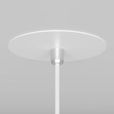 Close-up of the Nevill Conical Pendant Light - White showcases its minimalist design with a round white base and sleek silver attachment. A white cord extends downward from the center against a plain, light gray background.
