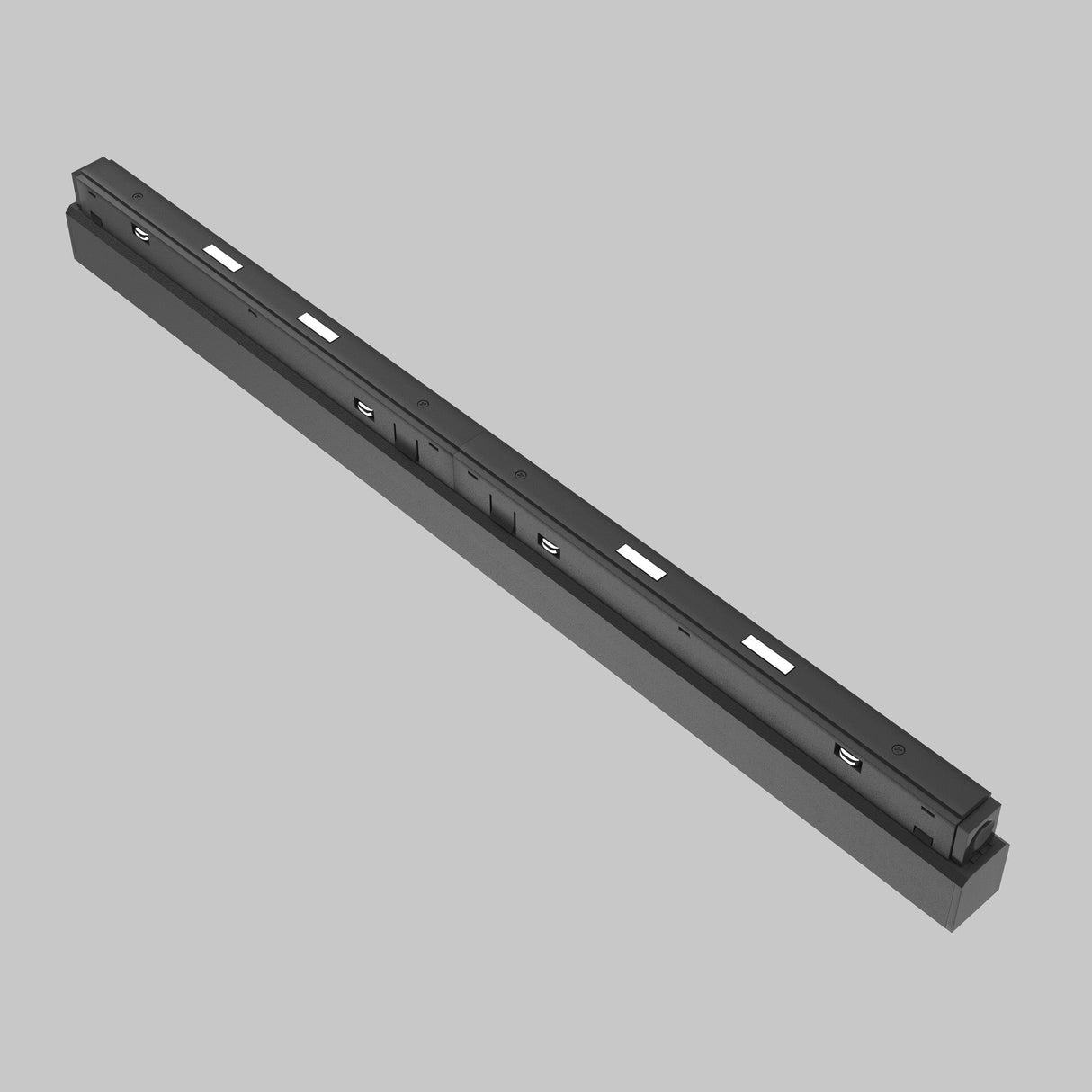 A black, rectangular object with small openings, set against a gray background, resembling the Points DALI CCT LED Dimmable Linear Track Light for Magnetic Exility 24W 2700-6000K.