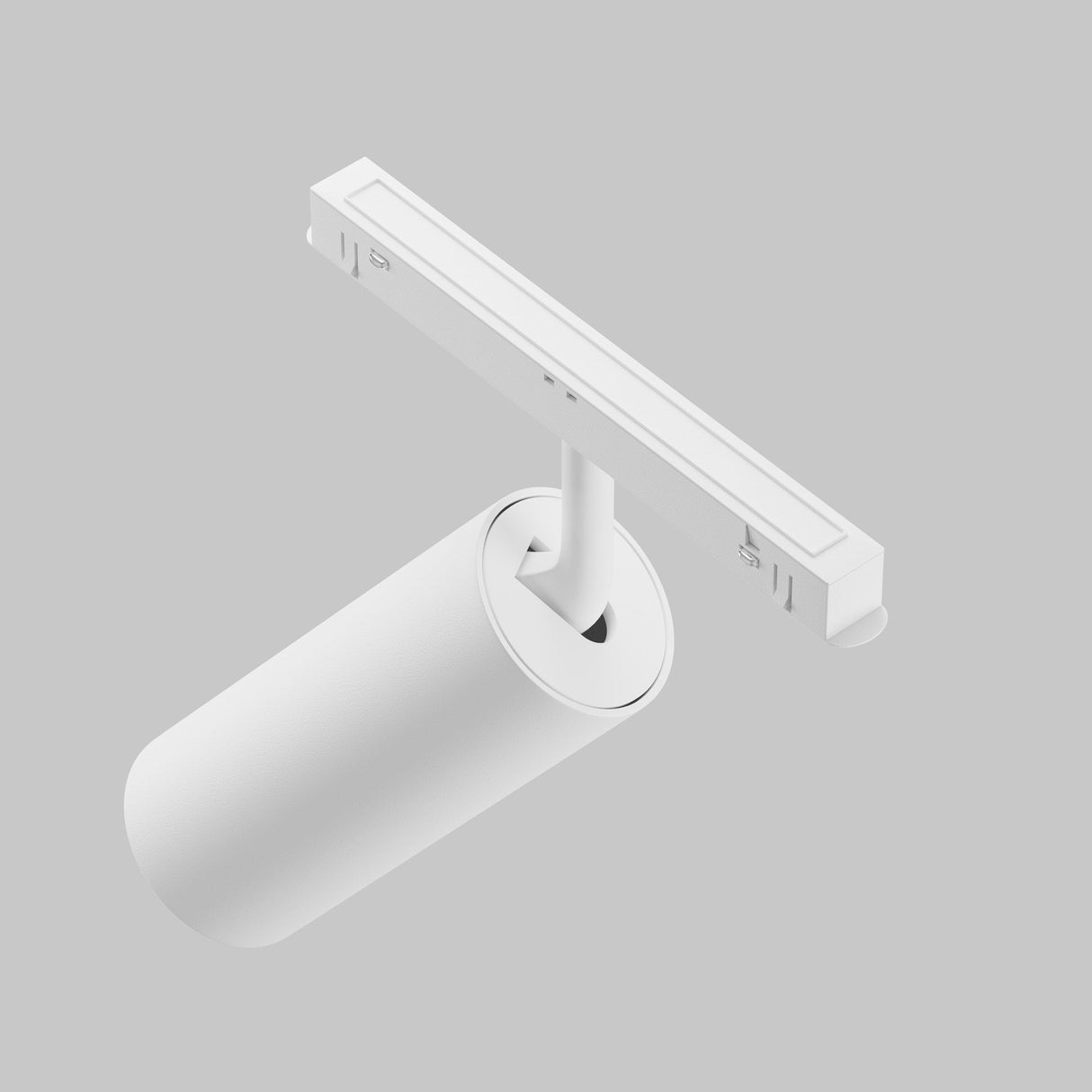 The sleek and modern Focus LED DALI CCT Magnetic Exility Track Spotlight 20W 2700-6000K in white has a minimalist cylindrical design with a thin horizontal mounting track over a light gray background and features DALI dimmable functionality.
