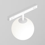 A sleek, modern design featuring a Luna CCT LED Dimmable Smart Magnetic Exility Track Globe Ceiling Light in white, emitting a subtle glow from 3000-6000K. The spherical lamp is suspended on a neutral gray background.