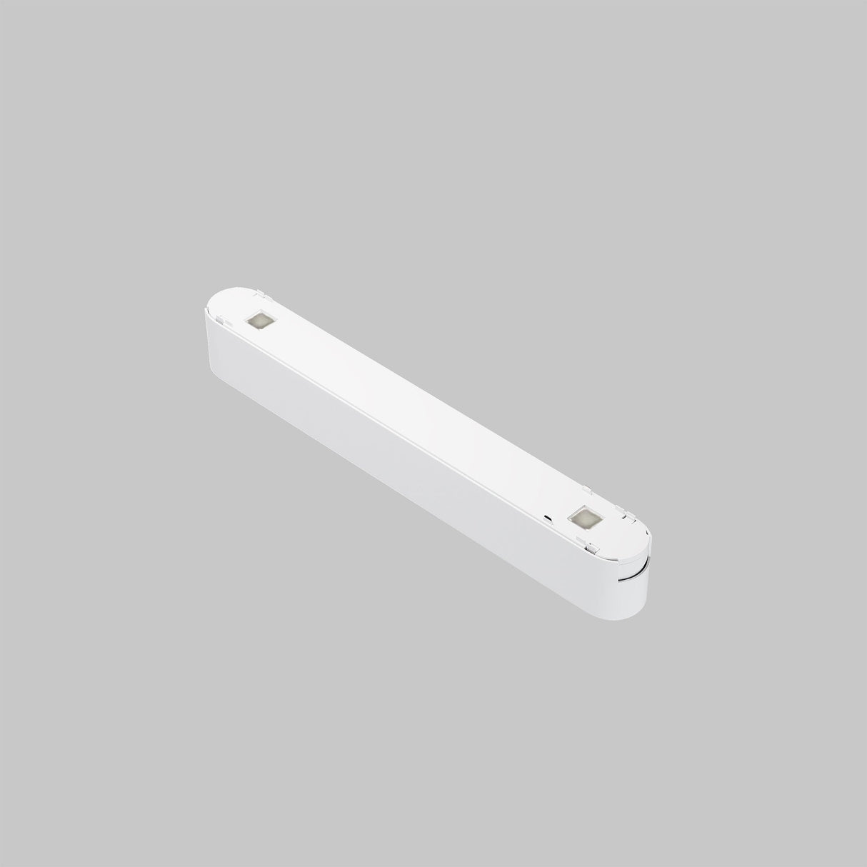 Illustration of the Points LED Linear Track Light for Magnetic Tracks Radity 12W in white against a plain gray background. It sports a sleek, rectangular design with smooth rounded edges and square fixtures at each end, providing a soothing 3000K warm color temperature.