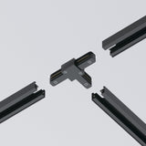 A Unity Single Phase Surface-Mounted Track T-Connector in black joins four rail segments against a light gray background, featuring visible screws that suggest its use in modular track lighting systems.
