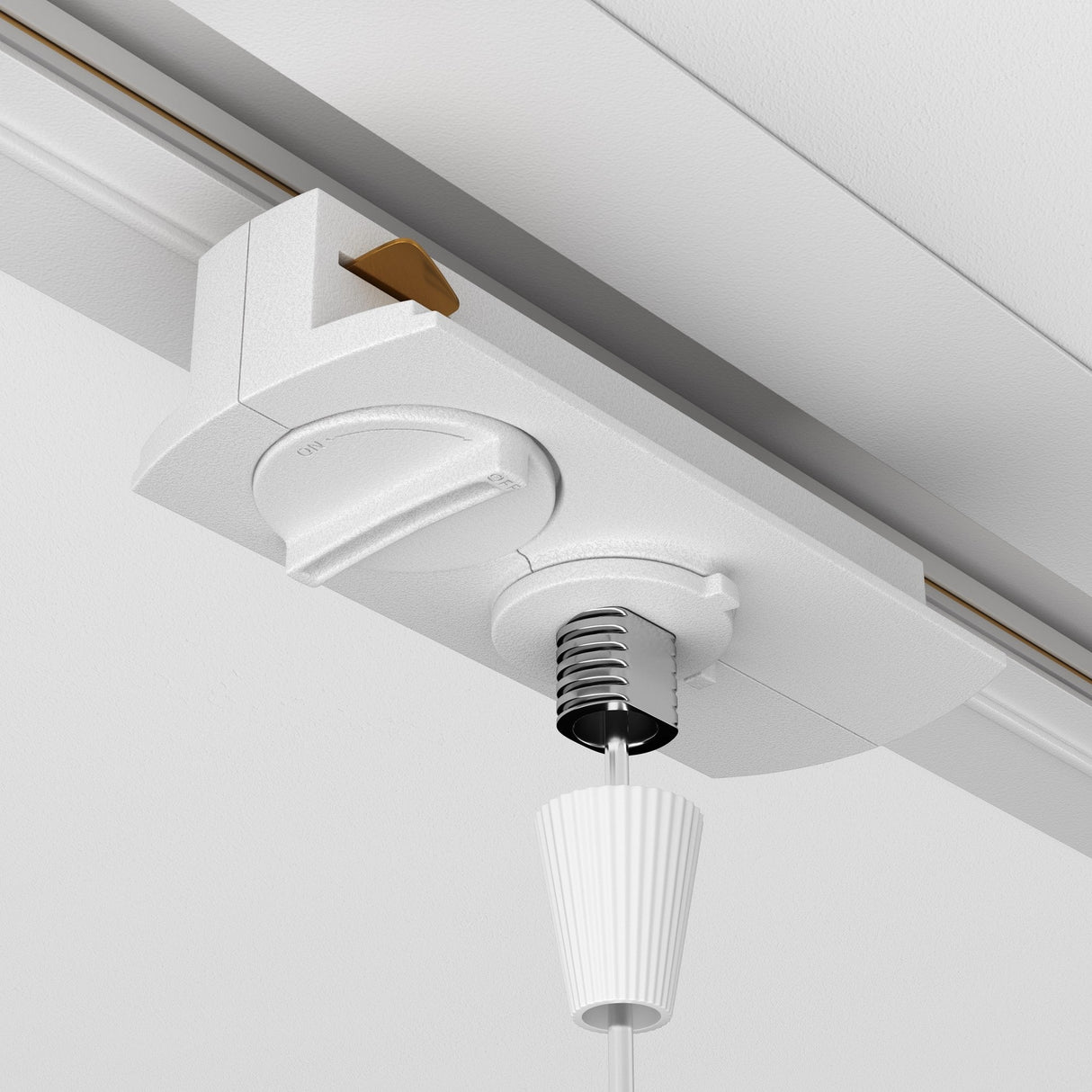 Close-up of a Unity Single Phase Track Connector in white, ceiling-mounted with an elegant pull cord. The modular unit includes a circular control knob and spring mechanism, and its ridged handle complements the light ceiling beautifully.