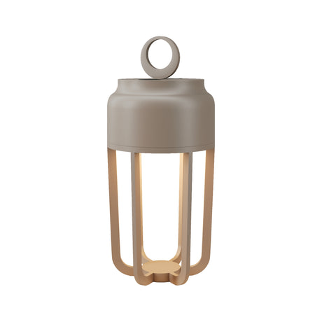Maytoni Vetra rechargeable LED table lamp in beige powder-coated metal, with a cylindrical top, four curved legs, and a circular carry handle.