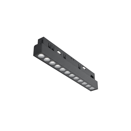 Maytoni Points 12W LED track light in black aluminium with a row of recessed circular lenses and rotatable 48V connector, on white.