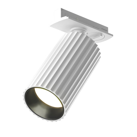 Maytoni Calipso track spotlight in white with a ridged cylindrical aluminium head on a rectangular track adaptor, shown against a plain background.