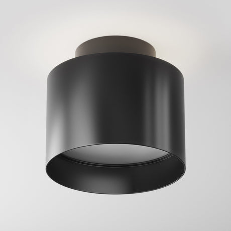 Technical feature of Planet LED Small Round Surface Downlight in Black, showcasing its functional design elements.