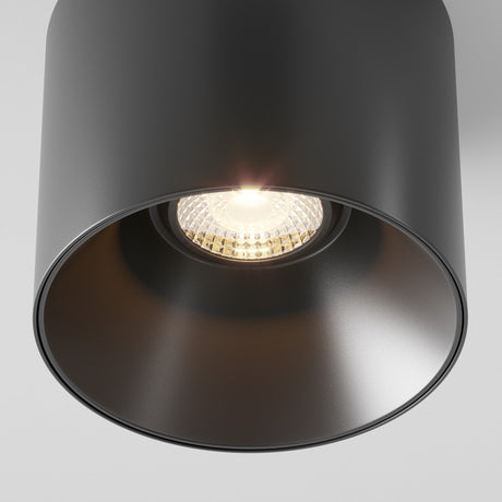 Close-up of Alfa LED Round Surface Downlight in black, highlighting its sleek finish and refined construction