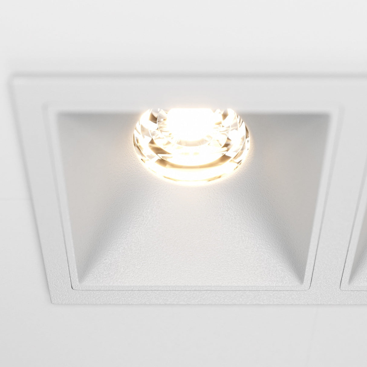 Close-up view of the Alfa LED Twin Fixed Square Recessed Downlight, highlighting its modern and sleek design.