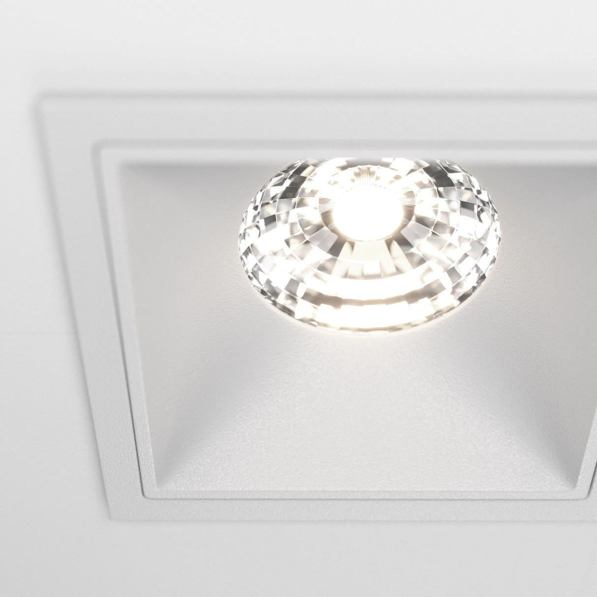 Close-up of the Alfa LED Dimmable Fixed Square Recessed Twin Downlight in white, emphasizing its sleek aesthetics.
