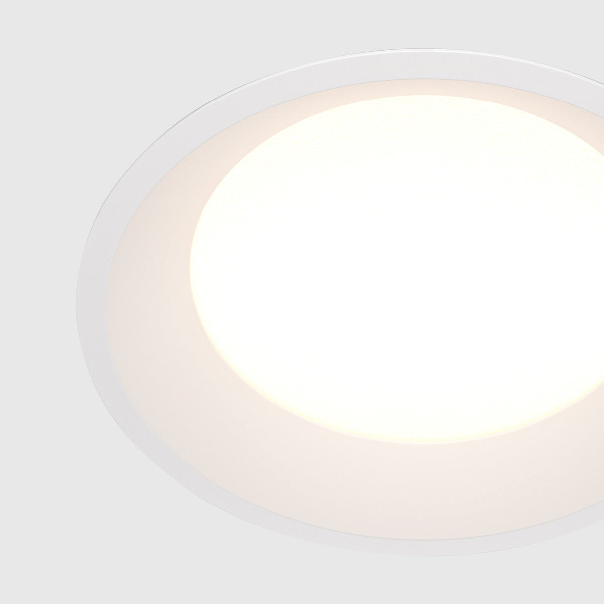 Element detail of Okno LED Round Recessed Downlight in White, emphasizing a subtle finish for modern ceiling integration.