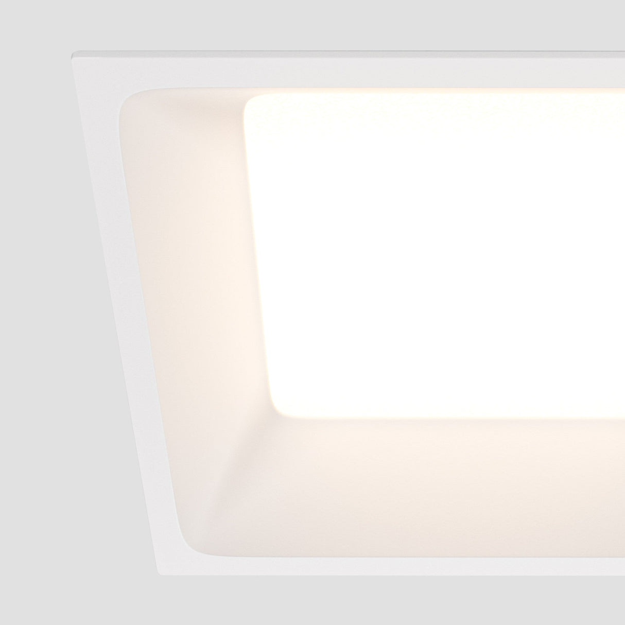 Close-up of Okno LED Square Recessed Downlight in white with a 120° beam angle, focusing on the expansive light spread and modern appeal