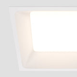 Close-up of Okno LED Square Recessed Downlight in white, focusing on its refined finish and discreet integration