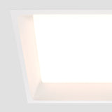 Element detail of Okno LED Square Recessed Downlight in White, highlighting a smooth finish for seamless integration in ceilings.