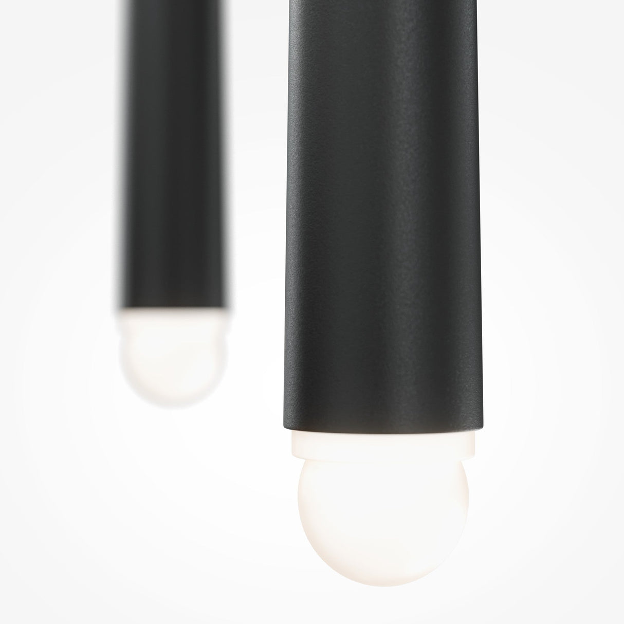 A close-up of the Cascade CCT Dimmable LED Cluster Pendant Light in black, featuring a modern design with bright white bulbs. These 19W pendant lights with 3000-4000K dimmable capability provide versatile illumination against a plain white background, enhancing any space.