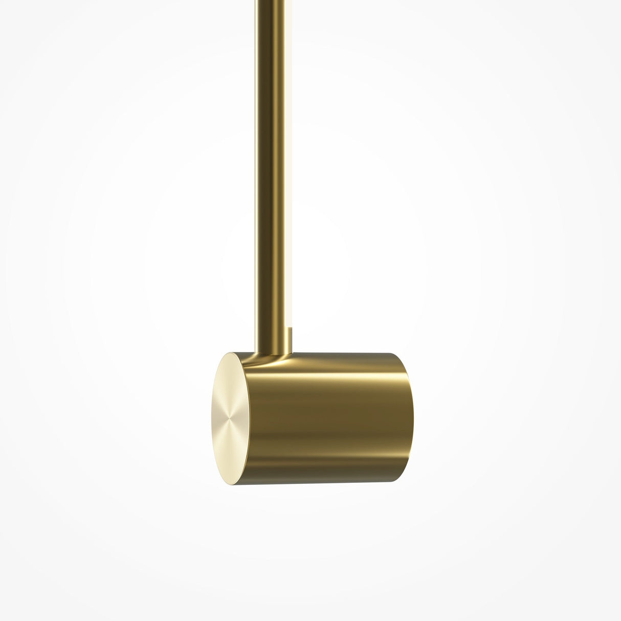 A sleek Light Stick LED Wall Light 7W 3000K in brass hangs downward against a plain white backdrop. Its cylindrical form features a smooth, reflective surface, highlighting its minimalist design and elegant contemporary style.