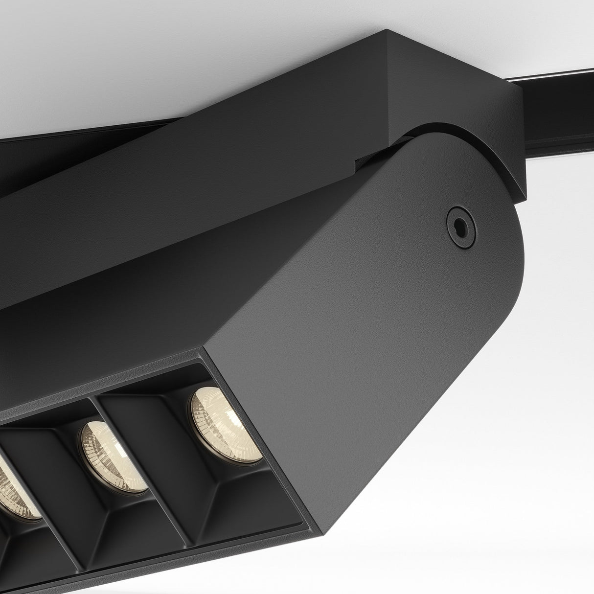 Element detail of Points Rot Linear track light in Black, highlighting fine control and adjustable design for magnetic tracks.