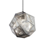 The Rango Small Pendant Light - Silver features a metallic dodecahedron design with acid-etched perforated panels, allowing light to shine through. It hangs by a cord and stands out against a white background.