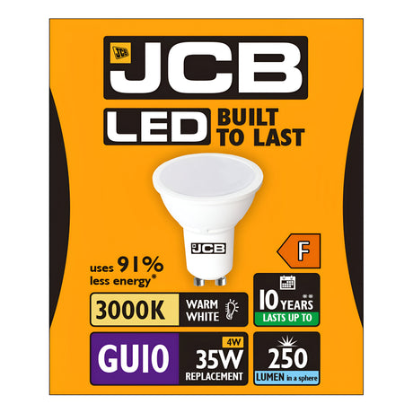 The packaging of the JCB 4W GU10 Non-Dimmable LED Bulb highlights its design as an energy-efficient replacement, delivering warm white light at 3000K. With a GU10 base, this bulb is built to last, using 91% less energy while providing 250 lumens and lasting up to 10 years, making it an excellent substitute for your old 35W bulb. It carries an energy rating of F.