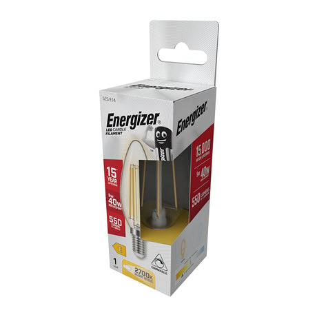 Image of an Energizer 5W Dimmable LED Candle Filament bulb in its retail package. The box showcases features like a lifespan of 15 years, an energy efficiency equivalent to 40W, brightness of 550 lumens, and a warm white light color at 2700K.