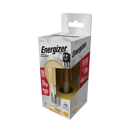 The packaging of the Energizer 4W Non-Dimmable LED GLS Gold Filament Bulb is displayed, showcasing its 15,000-hour lifespan and warm white glow at a 2200K temperature. As a 35-watt equivalent emitting 440 lumens, it fits seamlessly with an E27 screw cap. A cartoon battery character adds charm to the box.