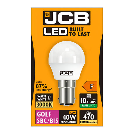 The image displays the packaging of the JCB 4.9W Non-Dimmable LED Golf Ball Bulb in orange and white. This energy-efficient bulb offers warm white light at 3000K, uses 87% less energy, lasts up to 10 years, and replaces a traditional 40W bulb with its output of 470 lumens.