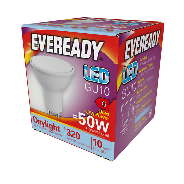 A 3D-rendered image highlights the vibrant red, purple, and orange packaging of the Eveready 4.7W GU10 Non-Dimmable LED Bulb - Daylight, 6500K. The box emphasizes its energy-efficient design, offering equivalent brightness to a 50W conventional bulb while using just 4.7W. It delivers daylight illumination at 320 lumens with a lifespan of up to 10 years and features an image of the bulb prominently on the box.