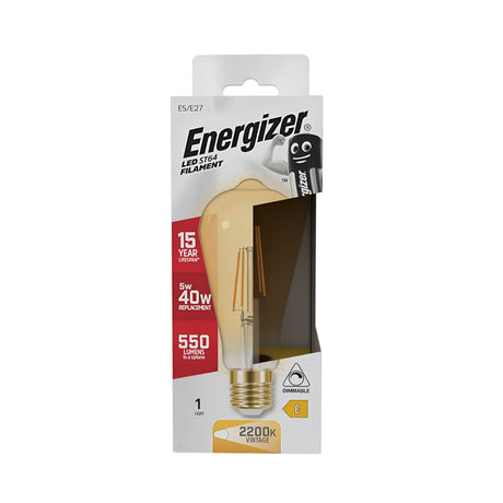 The packaging of the Energizer 5W Dimmable LED ST64 Gold Filament Bulb features a warm white hue and vintage 2200K color, offering 550 lumens. It is designed to replace a traditional 40W bulb and promises a lifespan of up to 15 years. The box includes an orange-tinted image of the bulb alongside the iconic Energizer mascot.