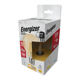 The packaging of the Energizer 5W G80 Dimmable LED Globe Gold Filament Bulb highlights its energy efficiency, promoting a lifespan of 15,000 hours and providing an equivalent brightness to a 40W bulb with 550 lumens of warm white light. The front features a playful cartoon bulb character that illustrates its convenient dimmable functionality.