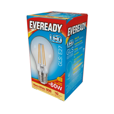 The Eveready 7W Non-Dimmable LED GLS Filament Bulb is packaged in a brightly colored box, marked as an E27 with a 60W equivalent, using only 7W. The front of the box showcases an image of the bulb and emphasizes its warm white glow at 2700K, providing 806 lumens. Known for its energy efficiency, the packaging also highlights a lifespan of up to 10 years.