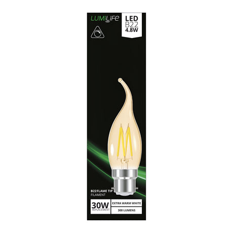Packaging for a LumiLife 4W dimmable LED tip candle bulb in warm white with a B22 base and 2000K color temperature. The box highlights its design, offering it as a 30W incandescent replacement, producing 300 lumens of extra warm white light.