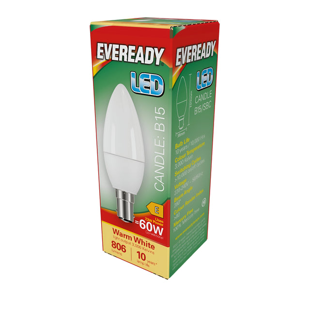 The Eveready 7.3W Non-Dimmable LED Candle Bulb, designed in a candle shape with the label B15, delivers energy-efficient warm white light at 3000K. It offers a brightness equivalent to 60W, producing 806 lumens, and boasts a 10-year lifespan. The packaging is green with red accents.