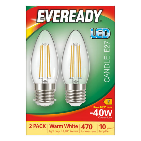 Packaging for the Eveready 4W Non-Dimmable LED Candle Filament Bulbs highlights their filament design and energy efficiency, offering a 40W equivalent power. They emit a cozy warm white light at 2700K with 470 lumens. These bulbs, which have an E27 base, are sold in a pack of two and feature an impressive 10-year lifespan.