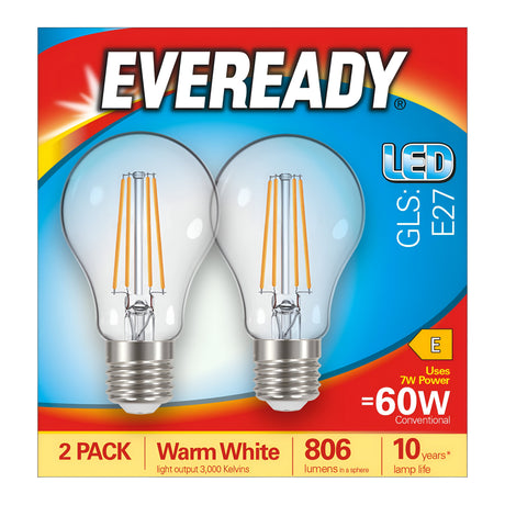 A package of two Eveready 7W non-dimmable LED GLS filament bulbs, each with power equivalent to 60W. They emit a warm white glow at 2700 Kelvins, featuring an E27 base and boasting a lifespan of 10 years, all enclosed in vibrant red and blue packaging.