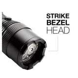 Close-up of the Energizer Rechargeable LED Torch 700 Lumen in black, featuring a textured grip and distinctive strike bezel head. The text "STRIKE BEZEL HEAD" is prominently displayed next to the torch, highlighting this specific design element. This rechargeable LED torch is ideal for versatile applications and includes convenient USB recharging capabilities.