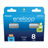 A package of Panasonic Eneloop AAA HR03 rechargeable batteries, shown in a blue design, showcases its long-lasting performance. The pack contains 8 AAA batteries, each with a capacity of 900mAh. The plastic-free packaging emphasizes that these batteries can be recharged up to 2100 times.