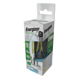 The Energizer 2.2W Non-Dimmable LED Candle Filament Bulb - Daylight, B22, 6500K comes packaged in a vintage design box that is mainly white with green accents, showcasing the energy-efficient bulb inside. The packaging highlights its specifications of replacing a 40W bulb by delivering 470 lumens and lasting up to 50 years. It includes an image of the bulb alongside the Energizer logo.